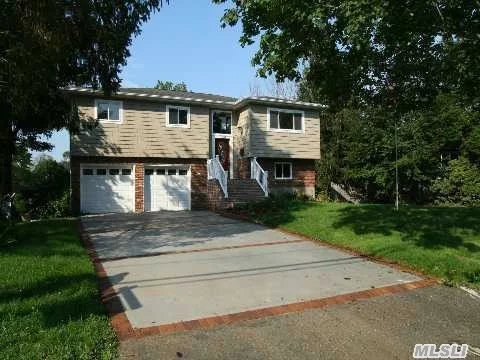 Totally Renovated House In 2007, Vaulted Ceiling In Kitchen With Granite, Stainless Appliances And Sliders Out To Second Floor Deck Overseeing Water. Dry! Never Had Water In The House During Sandy Or Previous Storms.