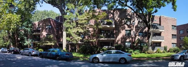 Sun-Drenched Corner Unit With Southern And Northern Exposure Overlooking Courtyard Garden. Hardwood Floors. Fabulous Terrace. Laundry And Storage Units In Basement. Great Neck South Schools. Conveniently Located Near Lirr, Town And Shopping