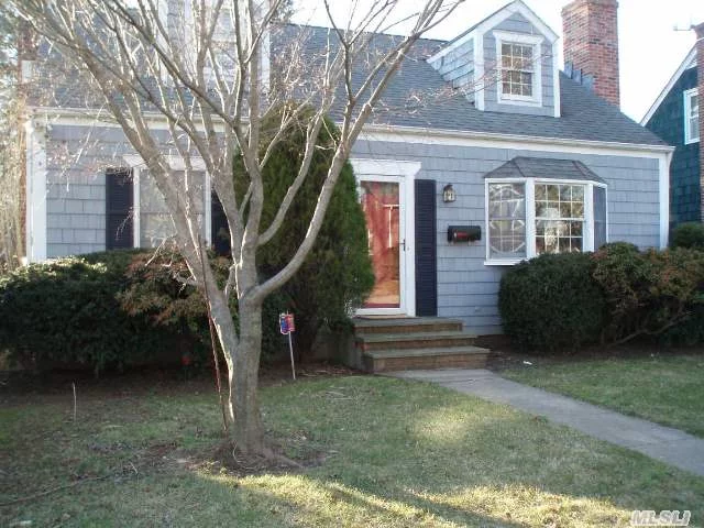 Most Charming 3 Bedroom Expanded Cape With Rocking Chair Porch Looking Over Private Yard. Cozy Rooms, New Fireplace, Bay Window, Library With Bookshelves, New Heating System, Alarm System. Ge Appliances