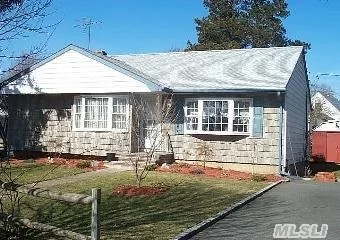 Expanded Ranch Offers 6 Rooms Plus Full Partially Finished Basement On Oversized 9, 350 Sq Ft Lot With Double Driveway. Beautiful Wood Cabinets In Expanded Kitchen With Open Dining Room, Hardwood Floors And Very Low Taxes. 150 Amps, 2 Zone Gas Hw Heat, Separate Gas Hw Heater, Cooking Gas, Gas Dryer. Most Windows Replaced And Vinyl Siding & Roof Approximately 10 Years Old.