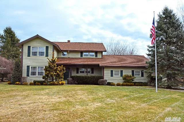 Spacious 4 Bedroom Home In The Heart Of Cutchogue. First Floor Is A Log Cabin With Hard Wood Floors And Fireplace. Open Floor Plan Living With Master Suite Upstairs. Private Backyard With Beautiful Landscaping.