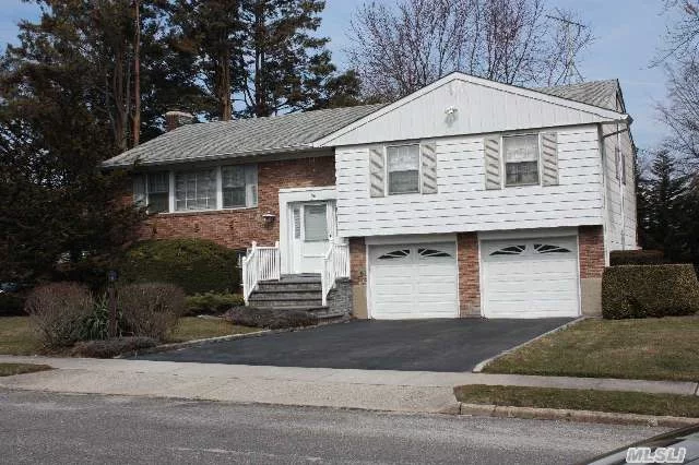 4 Bedroom, 2.5 Bath Hi Ranch Home In The Heart Of Jericho With Award Winning Syosset-Woodbury School District. Beautiful Hardwood Floors, Central Alarm System, Newer Furnace, All New Gas Piping, Large Backyard With Spacious Deck, In-Ground Sprinkler System, Great Location!!!