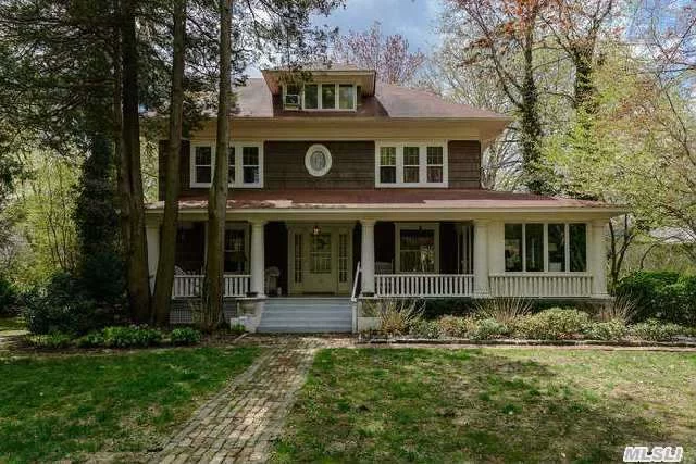 Charm & Character Abound In The Lovely Vintage Colonial Set On 1/2 Acre Of Beautiful Gardens And Privacy. Original Period Details Include Leaded Glass Windows, Pocket Doors, Wood Floors, Fireplace, Rocking Chair Porch & Back Stairs. Lovingly Restored & Meticulously Maintained, Also Features Two Separate Prof Offices. Serious Seller Will Consider All Realistic Offers.