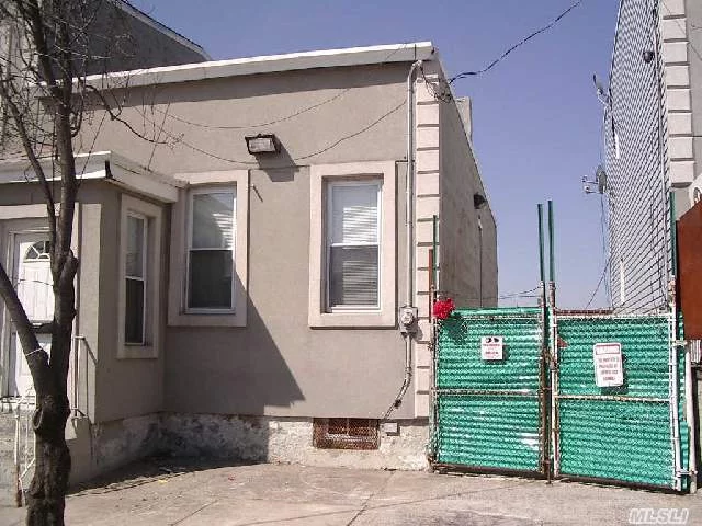 This Is A Commercial Property Located In M2-1 (Manufacturing) Zoning. Far Is 2 With A Potential Of Constructing A Second Floor. It Currently Has Two Rooms,  With A Full Bathroom. It Has A Lot Of Potential For The Right Buyer. Its Located Close To City With Quick Access To Highway And Midtown Tunnel. It Has A Shared Driveway.