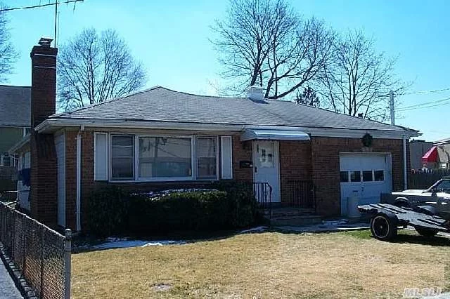 Location, Location, Location! Investors Delight-5 Room, 2 Bedroom, 1 Full Bath Ranch Located In A Quiet Neighborhood. Close To L.I.R.R, Shopping, School Bus Around The Corner, Roslyn School District. ***Sold As-Is***