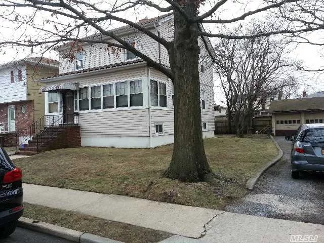 Great Investment 2 Family In Lynbrook. Large Property With 2 Car Detached Garage, Tenant Occupied Upstairs Till 11/17/2014. Lower Tenant Lease Expires 8/7/15 $1550 Per Month, Combined Gross Income $3000. Fabulous Layout With Fireplace. Close To Lirr, Shopping And Houses Of Worship.
