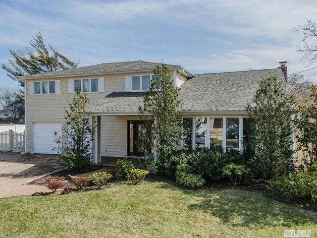 A Prestigious Location In The Heart Of The Harbour Green Community For This Beautiful Colonial Split, Mid-Block W/Great Backyard!This Home Features: New Roof/Siding/Central Air*Gleaming Hwflrs*Designed Eik W/Granite Counter*S/S Appliances/Radiant Ht*Lr W/Cathedral Ceilings*New Baths*Main Level Family Rm*Bsmt And Garage! Beach Club/Marina Rights..Hi & Dry No Storm Damage