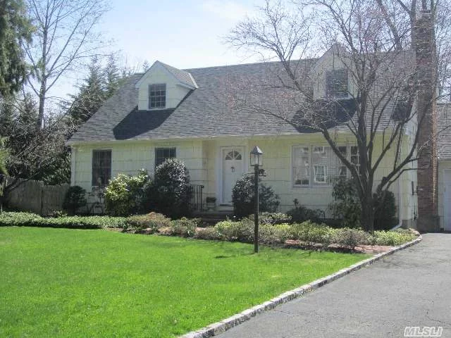 Located Mid Block On A Sought After Locust Valley Street Is This Updated Home Filled With Light And Space. Second Bedroom On First Floor Is Presently Used As A Den. Can Be Either A Three Or Four Bedroom Home. Basement Is Large And Could Be Finished. Private Backyard With Beautiful Plantings. Renovated To Perfection!