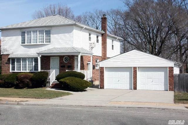 Rare Find! True Legal Two Family House In Desirable School District 21 In Bethpage. Large Home Great For Extended Family Or Money Maker For The Real Estate Investor. Upstairs Features Large 2 Br,  1 Bath,  Lr,  Dr,  Eik Over A 3 Br,  1 Bath W/Lr,  Dr,  Eik,  2 Car Garage,  New Roof On House & Garage. New Driveway,  New Oil Burner.