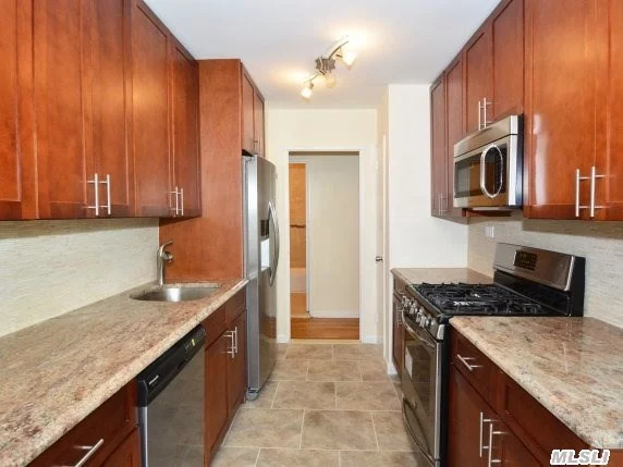 Sponsor Owned And Newly Renovated Corner 3 Bedroom/2Baths-1500 Sq. Ft Corner Sun Filled Unit-no Board Approval Required. Gleaming Hardwood Floors, Central Air/Heat And Reserved Parking Included. Close To Bay Terrace Shopping; Easy Access To All Major Highways.S.D # 25.