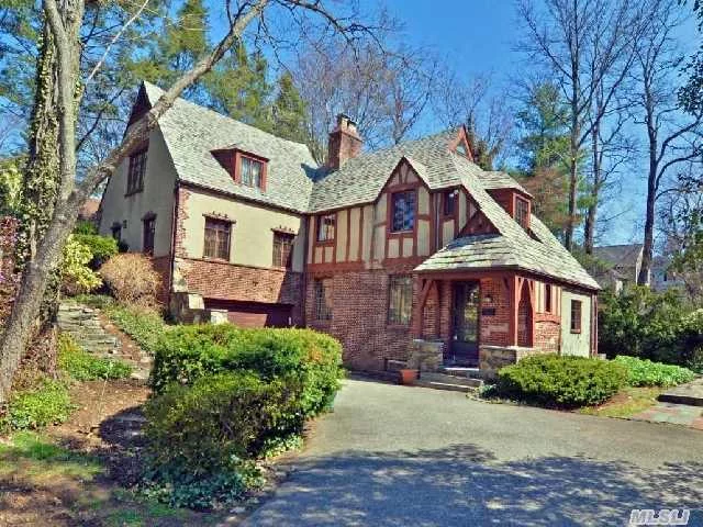 Stately Tudor. 3-4 Bdrms, 3.5 Baths. Needs Tlc. Cac Partial-Not Entire House. Church Is Tax Exempt And Taxes Have Not Been Grieved. Beacon Hill Beach & Tennis Rights, Annual Association Dues Are $175.00.