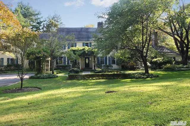 Enjoy This Muttontown Residence Surrounded By Soft Sweeping Views Of Verdant Lawns With A Slate Terrace Offering True Gold Coast Living.Sparkling Doors Of Glass Frame Views From The Living Rm, Eik, Library, & Guest Quarters. This Well Appointed Home Has Been Meticulously Executed & Offers An Unparalleled Sense Of Elegance.