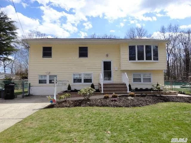 This Wide Line Hi Ranch Situated In Islip Schools Is On A Prime Residential Block And Features Lg Living Rm And Dining Rm W/Hardwood Flooring, Updated Kitchen, Converted Garage To Extra Living Space, New Front Stoop On Nicely Landscaped Property.