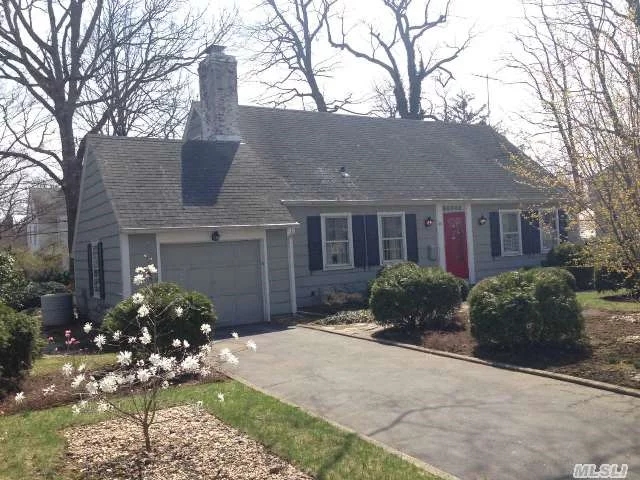 Charming Country Cape, Four Bedrooms & Two Baths, Wood Floors, Living Room With Fireplace, Screened In Porch, And New Hot Water Heater.