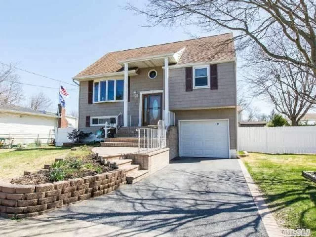 Beautiful (4) Bedroom, (2) Full Bath Home Has Hardwood Floors Throughout, Updated Eik And Bathrooms, (2) Decks, Paver Patio (Fire Pit) & Entrance, Fully Fenced, Gas Heat, Newer Vinyl Siding & Roof, 200 Amp Elec. Service. Islip Schools - Taxes With Star $9778.73. Nothing To Do But Move In!!