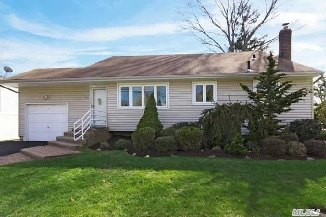 This Lovely Front To Back Split In Midblock Loc On Parklike Prof.Landscaped Property Features Updated Eik, Bths, Windows, Cac, Hardwood, New Pavered Walk, Fence, Multi Car Drvwy, Ugs, Alarmed.Convenient To Houses Of Worship.Taxes Reflect No * Exemption Of $1418