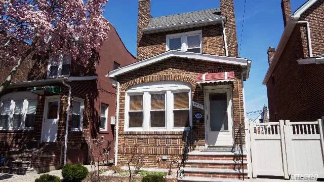 Beautiful Detached Brick Colonial House In North Flushing, Legal 2 Family Used As 1Family, Renovated Kitchen And Bathrooms, Hardwood Floors Throughout, Full Finished Basement With Separate Entrance, Finished 2 Cars Garage, Updated Electrical And Plumbing, Convenient Location, Just Move In!