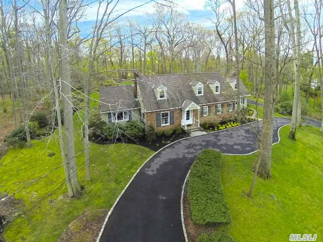 Matinecock Colonial Sitting On 2+ Acres On A Cul-De-Sac. Property Backs To The North Shore Wildlife Sanctuary, Coffin Woods. Built In 1959 With 12 Rooms, 5 Bedrooms, 4 Bathrooms, 2 Fireplaces, Rear Staircase, Central Air-Conditioning. 2005 Award Winning Gardens From The Long Island Nursery And Landscape Association; Home Was Also Featured In House Magazine.