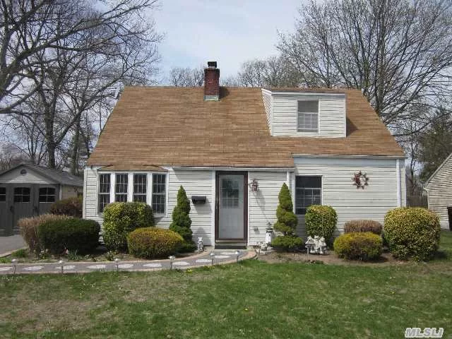 Adorable 4 Bedroom Cape In West Islip Offers Bamboo Flooring, A Charming Fireplace, Plenty Of Natural Light And A Spacious Backyard On .37 Acre. Freshly Painted.