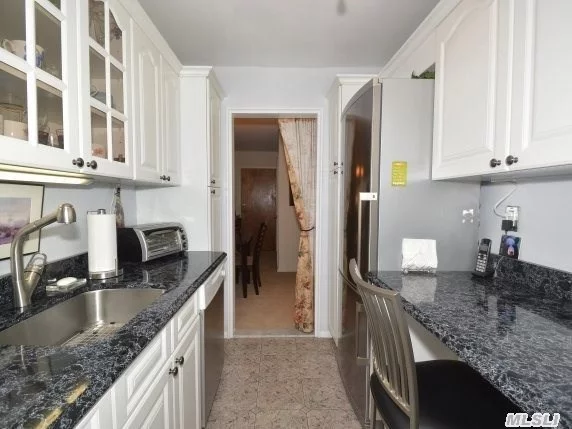 Detached Corner One Bedroom, Renovated Throughout... Sunfilled With 4 Exposures. Designer Accents Throughout. Situated In The Heart Of Bay Terrace In Quiet Cul-De-Sac. Walk To Bay Terrace Shopping Center.Express Bus To City Steps Away. Low Maintenance Includes All.