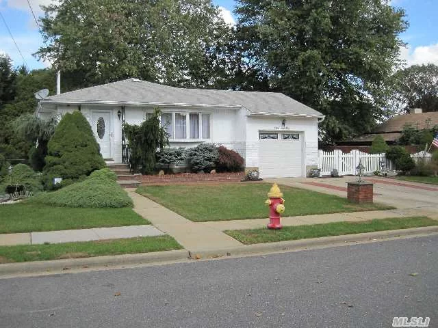 Absolutely Immaculate 3 Bedroom Ranch With Hardwood Floors On Fenced 86X100 Manicured And Landscaped Lot. Plus Garage, Double Wide Driveway And Basement With Wash/Dry On Quiet Street In North Massapequa South Of Southern State Parkway. Farmingdale Schools.