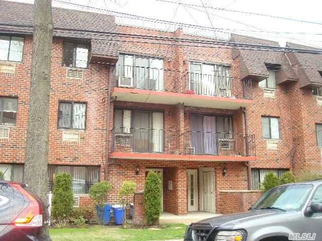 Young Well Maintained Duplex Two Bedroom Condo. Hard Wood Floor.  Tree Line Street,  Close To Shopping, School And Transportation.