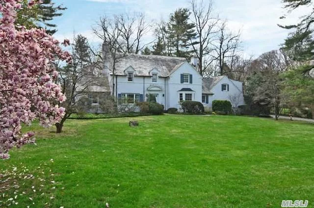 Stately Center Hall Colonial Reflects The Quality & Panache Of Bygone Years. Entry Foyer W/Graceful Winding Staircase, Archways Providing Passage Between Principal Rooms. Five Spacious Bedrooms, 4.5 Baths, Sitting On 1.52 Acres Of Flat, Park-Like Property & Mature Landscaping Set The Stage For Glorious Outdoor Entertaining. Truly A Classic Flower Hill Home To Make Your Own