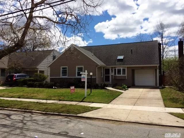 Expanded Ranch All New Everything! Mid Block Locale In Heart Of Cedarhurst. Brand New Roof, Siding, Windows, Skylite, Doors, Kitchen, Appliances, 2.5 Bathrooms, Hardwood Floors, Tile Floors, Carpeting, Heating System, Prof Landscaped And Ready To Move In Today! Sliding Glass Doors Leading To Back Deck. Enormous Master Suite W/Bathroom. Custom Kitchen And Bathrooms.