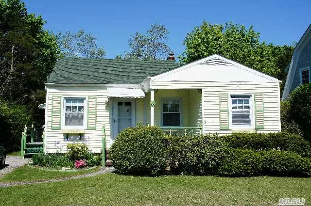 This Adorable Doll House Is Waiting For You!!! Features Include: New Anderson Windows, New Roof, New Heating System & Hardwood Floors. Great Location Close To Town, Shopping, Restaurants & Beaches.
