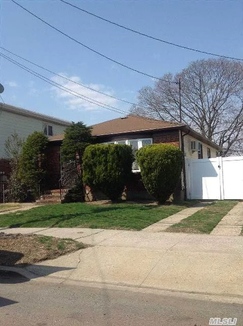 Well Kept Home In Highly Desired Neighborhood In Southeast Queens; Schools, Shopping And Transportation Nearby. Roof, Siding, Windows, Hot Water Heater Have All Been Recently Replaced. Wood Floors In All Bedrooms And Living/Dining Areas. Smoke/Fire Detectors And Carbon Monoxide Detectors Are Also Installed.