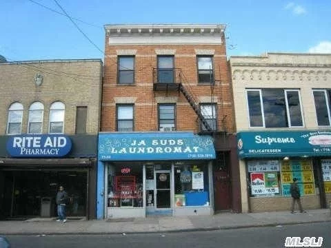 Mixed Use Fully Occupied Building On Busy Commercial Street. Very Easy To Rent. Convenient Location With Bus Stops Only Steps Away.