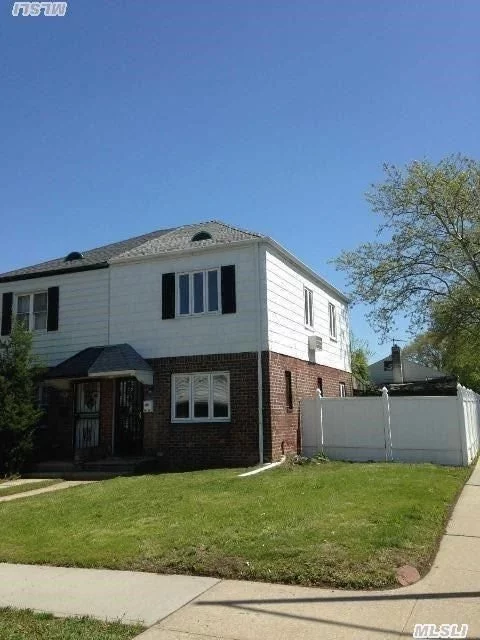 New Windows And Doors, New Bath, New Hot Water Boiler, Hardwood Floor, New Sump Pump In Basement, Finished Basement, Two Years Old Roof, R3-1 Zoning Lot For Two Families House. New White Vinyl Fence.