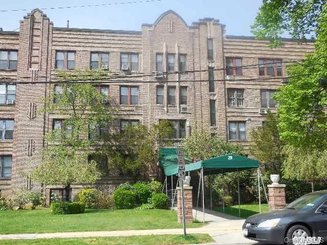 Fabulous & Spacious Sunny Corner Unit In Elegant Pre-War Elevator Bldg In The Heart Of Woodmere. Plenty Of Closets Throughout... A Must See! Outdoor Parking $40/M. Indoor Parking $60/M.