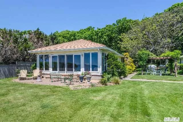 Magnificent Private Sandy Beach Steps From Your Door W Beautiful Views Of Peconic Bay Sunrise To Sunset! Come Enjoy This Year Round 3-4 Bedroom Rental, Updated Ranch Boasting A New Gourmet Kitchen With Granite/Stainless & Wood Floors.