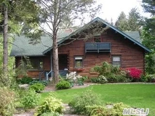 White Cedar Canadian Log Home. This Custom 3 Br Residence With Numerous Upgrades Was One Of The Original Homes Built In This Community And Features A Living Room With Cathedral Ceiling And Stone Fireplace, Tongue And Groove Interior Pine Walls And Maple Floors. A Covered Foot Bridge, Winding Pathways, Extensive Decking And Beautiful Gardens Add To This Unique Property.