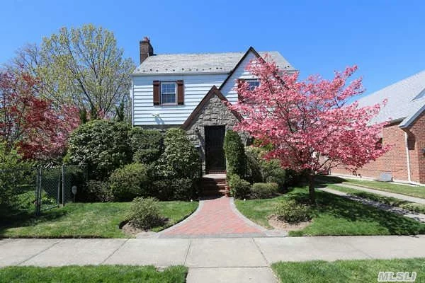 This Colonial Tudor In Centrally Located To Shopping And Highways, Restaurants, St John&rsquo;s University. Yard Is Fenced And Well Manicured. The Home Has Hardwood Floors, Eat-In-Kitchen With Granite Counter Tops, 3 Terraces And A Patio, Full Finished Basement And Slate Roof. Turn Key Must See It!!