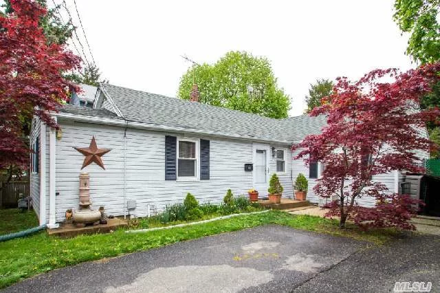 Perfect Starter Home Or Retirement Home Features Updated Eat-In-Kitchen, 2 Bedrooms, Living Room And Full Bath. Outside Entrance To Patio And Sun Filled Backyard. Oversized Driveway. Close To Lirr, Shopping, Restaurants & Highways.