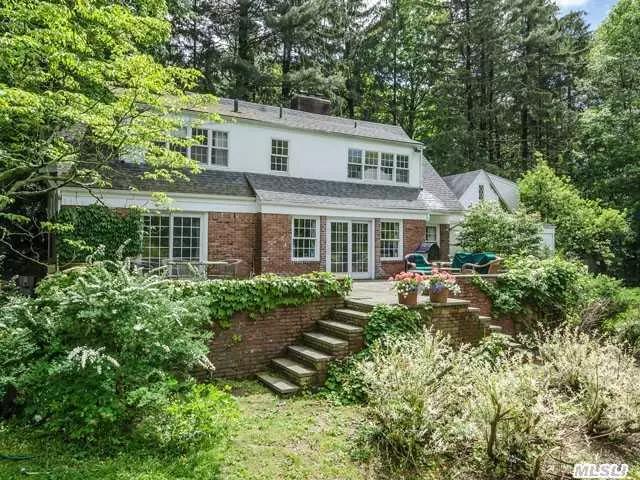 Wonderful 4 Bedroom Expanded Cape Located In Lattingtown Harbor On 2 Acres W/ Mature Plantings. Slate Patio Overlooking Back Property Perfect For Entertaining. Beach + Mooring Rights. Close To Town, Shopping, & Lirr. Prospective Purchasers To Verify Taxes & Info. Association Dues.