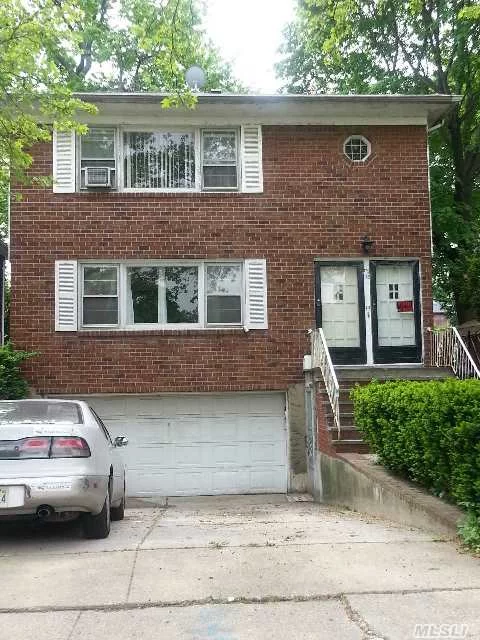 Rare Find In Fresh Meadows. Bright And Spacious Colonial 2 Family Brick House. The 1st Floor Offers Living Room/Dining Room, Eik, 3 Bedrooms, 1 Full Bath, 1/2 Bathroom.2nd Floor Offers Living Room/Dining Room, 3 Bedrooms, 1 Full Bath, 1/2 Bathroom, Eat In Kitchen, Full Finished Bsmt W/ Sep Entrance, 2 Car Garage. Huge Pvt Backyard. Top Location