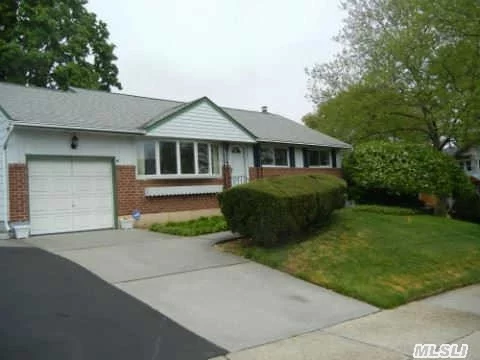 Beautiful Corner Property With A Great Yard.Lard Driveway.