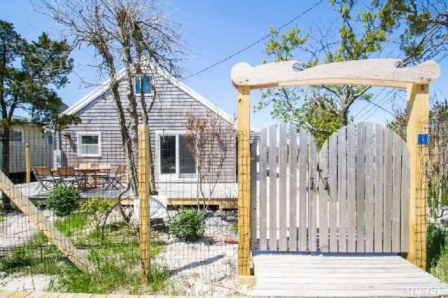 Charming Fire Island Summer Home In Ocean Bay Park. Totally Renovated Throughout Home, Brand New Kitchen, And Appliances. Spacious Deck For Entertaining Guests. Can Generate Income With Summer Rental Market.