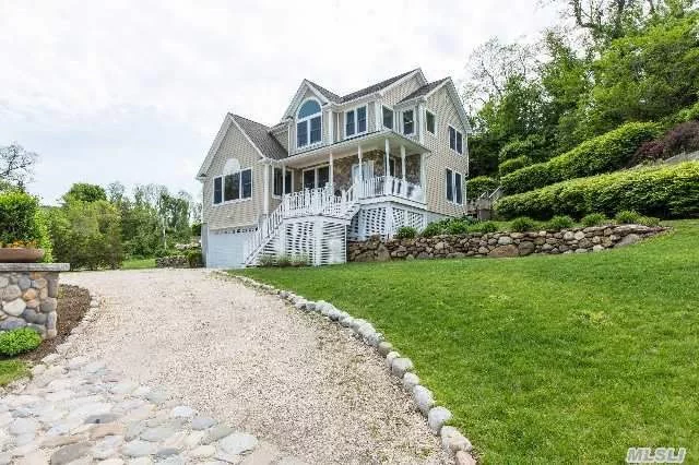 Situated On A Hilltop With Stunning Sound Water Views, Just Steps From Duck Pond Point Sound Beach. This Is A Must See! 4 Br, 2.5 Ba, Large Eik, Fam Rm, Lr W/ Fp, Covered Front Porch, 2 Car Garage...Lots Of Natural Light And Plenty Of Space To Enjoy As Your 2nd Home Or Year Round Residence!