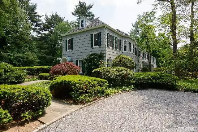 Traditional Colonial With 7 Bedrooms. Beautiful Pool And Terraces. Very Private Property. New Roof, New Gas Heating System, Plaster Walls, All Asbestos Removed, Basement Waterproofed. Pool Resurfaced.Located In The 4 Acre Zoning Area Of Lattingtown.