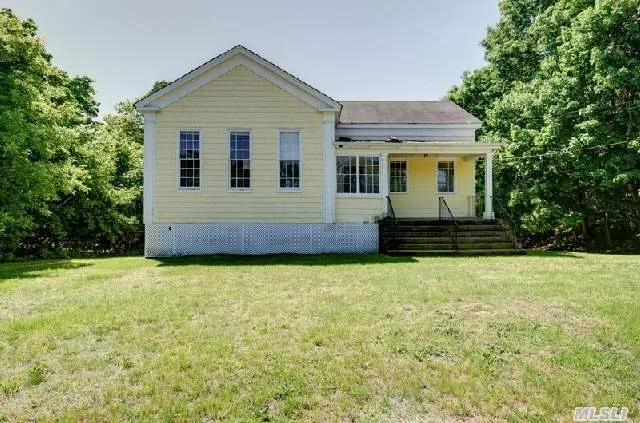 Originally Built As A School House. 10Ft Ceilings, Tall Wavy Glass Windows. Second Use; Town Hall, Then Moved To Current Location Where Foundation Was Added And Building Was Made Into Three Units And Used As A Residential Apartments. Zoned For Hamlet Business. Many Uses Per Town Code!