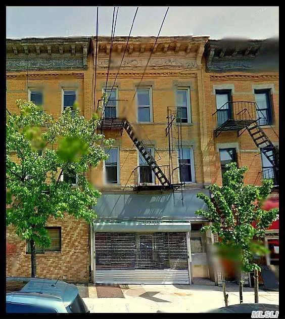 Mix Use Brick Attached 3 Family With Store. 1st Fl: Store (Vacant) & 1 Bedroom Apartment ($1150).  2nd Fl: 3 Bedrooms (Owner Occupied). 3rd Fl: 3 Bedrooms (Possibly Vacant).  All Hardwood Floors And High Ceilings. Property In Good Condition. All Income For Vacant Units Is Projected.