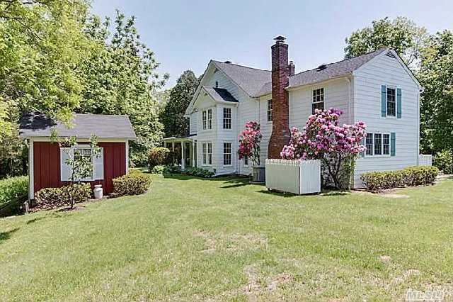 Encircled By Woods&Set High On A Grassy Slope, This Private 3+Acre Compound Includes An Elegant 4-Br Main House & A Charming Legal 2-Br Guest Cottage, Created Out Of Part Of A Former Potato Barn. A Workshop &, Boat House Comprise The Remaining Barn & 2 Other Accessory Buildings Complete This Bucolic Setting.This Well-Maintained Property Is Truly A Unique & Enchanting Retreat!