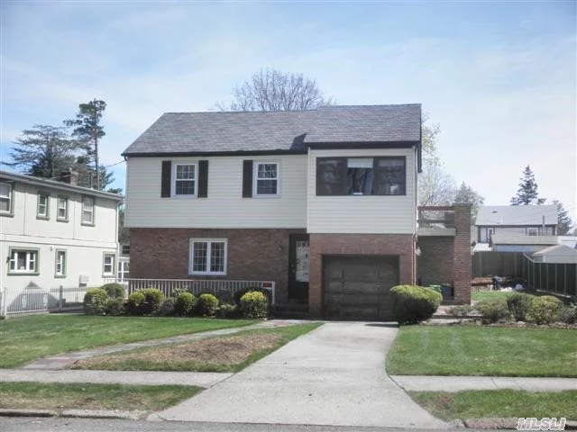 Beautifully Maintained Brick & Frame Detached Colonial House With New Windows, New Roof & Nice Hardwood Floor. Finished Basement. 71X140 Manicured Oversized 9200 Sq Ft Property. Great Flow Of Entertaining. ! Parklike Back Yard With Patio. Best School Dist#26, Ps188 School.