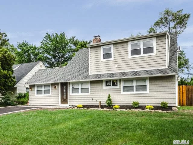 Beautifully Totally Redone Expanded And Dormered Levitt Ranch, Completely New Windows, New Plumbing, New Electric, New Insulation Move Right In, 4 Brs, 2 Bath, Stainless Steel Appliances, Stone Fireplace, All Wood Floors. Boiler Moved To Rear Of House. Beautiful Covered Patio.