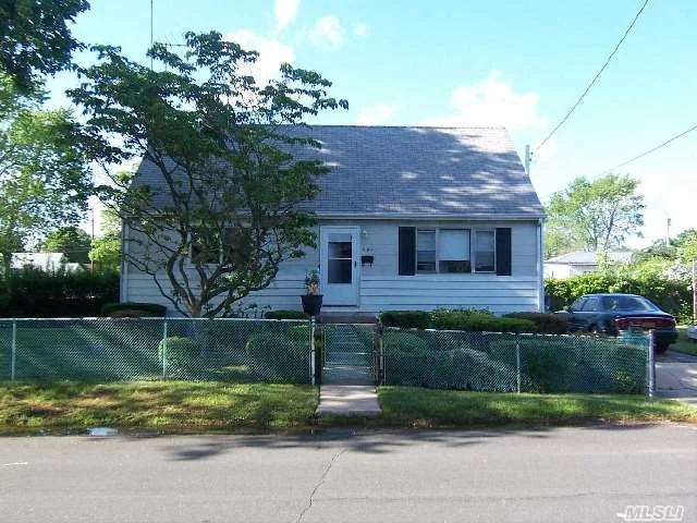 This Cape Has 3 Bedrooms, An Updated Bathroom W/ Heated Tile Floors, The Whole Left Side Of House Was Gutted And Redone In 2011, New Sheetrock, Electrical, Andersen Windows And Moldings/Doors. Gas Heat. Eat-In-Kitchen W/ Tile Floors And Side Entrance. Full Unfinished Basement W/ Ose. Located In Village Of Lindenhurst. *Info Provided By Homeowner, Buyer To Verify*