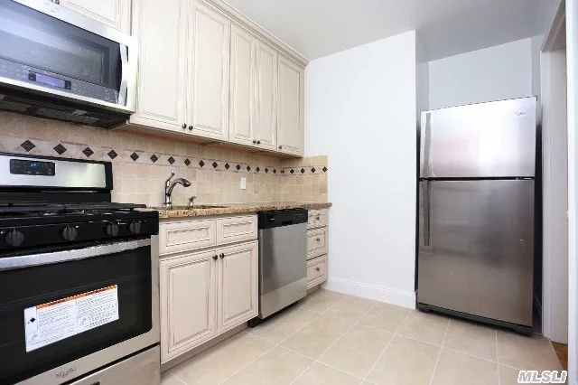 Mint Condition 2 Bedroom Unit Upgraded Throughout! Hardwood Floors And Recessed Lighting With Ample Closet Space. Kitchen Features Convection Microwave, 5 Burner Gas Oven W/Grill, A Dishwasher, New Tile Work And Back Splash Tile Work. Newly Painted And Ready To Move In!